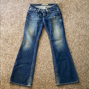 mid ride boot cut detailed pocket jeans